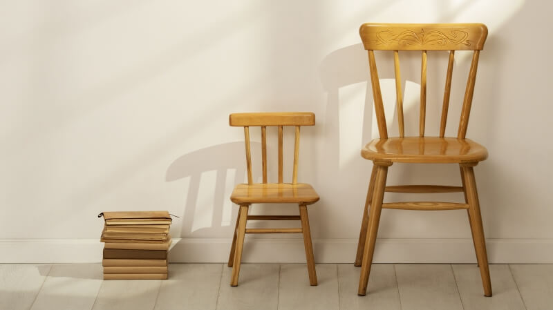 Nowoczesne krzesło biurowe w salonie - przedmiot na literę K w grze Państwa-Miasta